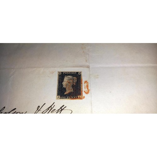 667 - Two mid 19th century penny black postage stamps on postmarked envelopes.