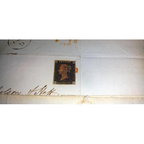 668 - Three mid 19th century penny black postage stamps on postmarked envelopes.