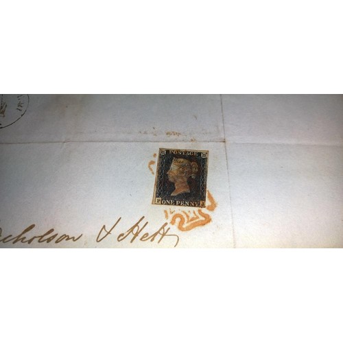 668 - Three mid 19th century penny black postage stamps on postmarked envelopes.