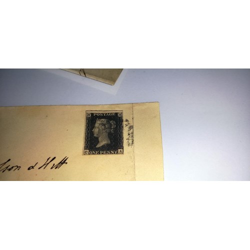 669 - Six mid 19th century penny black postage stamps on postmarked envelopes.