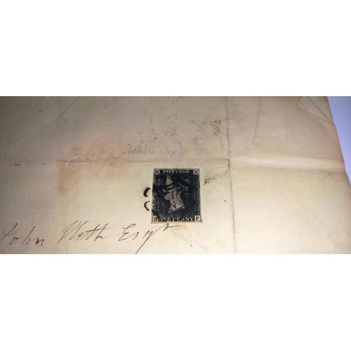 673 - Two mid 19th century penny black postage stamps on postmarked envelopes.