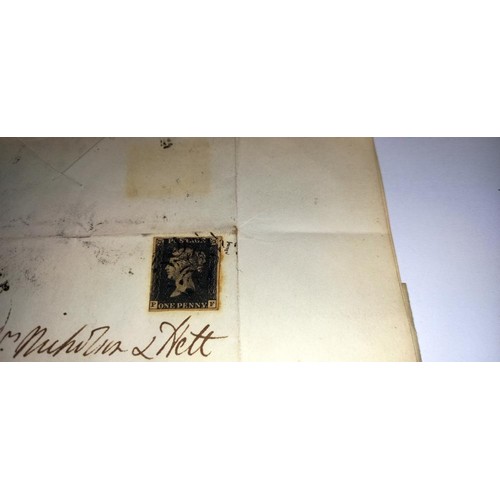 675 - Two mid 19th century penny black postage stamps on postmarked envelopes.