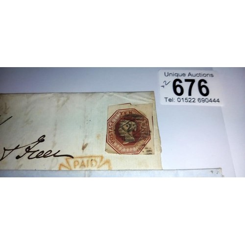 676 - A penny red, a twopenny blue and one other postage stamp on postmarked envelopes.