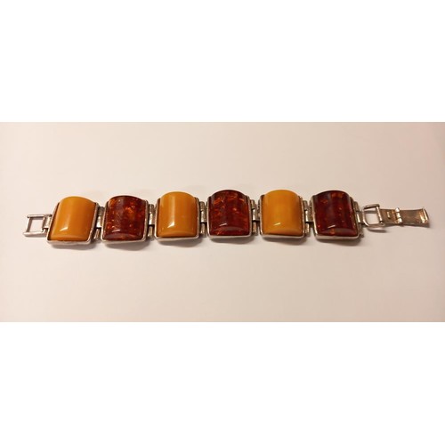 130 - A heavy amber silver bracelet.