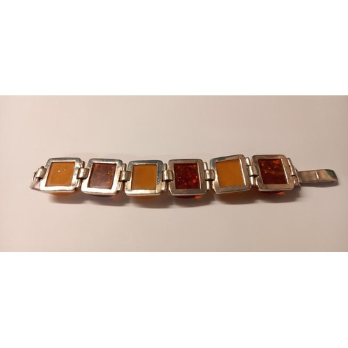 130 - A heavy amber silver bracelet.
