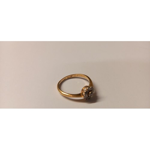 131 - A rose cut diamond cluster ring stamped 18ct, dated 4/3/1920, size M half, 2.2 grams.