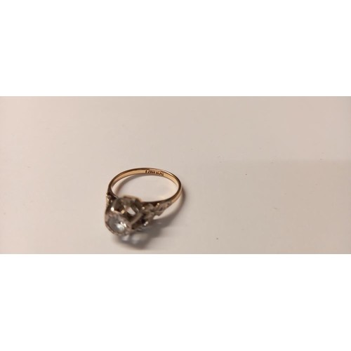 142 - A vintage ring circa 1940/50 set with a white stone in 9ct gold, size L, 2 grams.