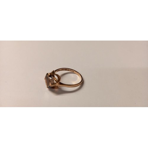 146 - A 9ct gold smoky quartz ring, London 1980, size L, 2 grams.