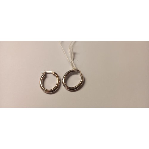 147 - A pair of 9ct white gold ear hoops, 2 grams.