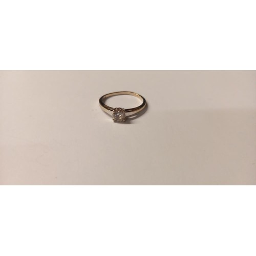 150H - A 9ct gold ring set single white stone, size R, 2 grams.
