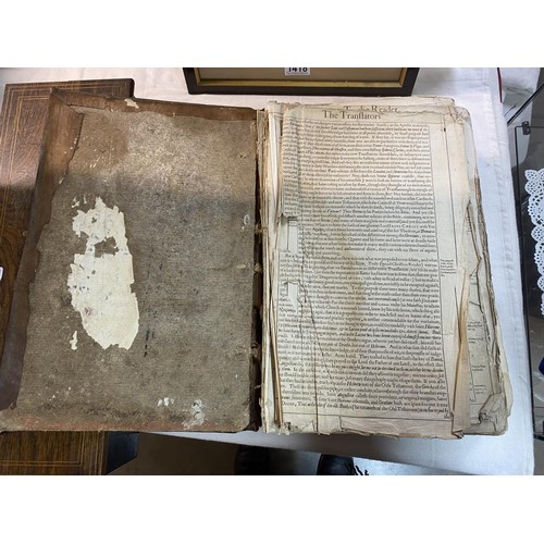 523 - An early 18th century Bible, some pages need attention but in fair condition for age.