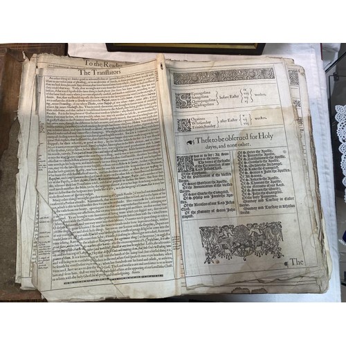 523 - An early 18th century Bible, some pages need attention but in fair condition for age.