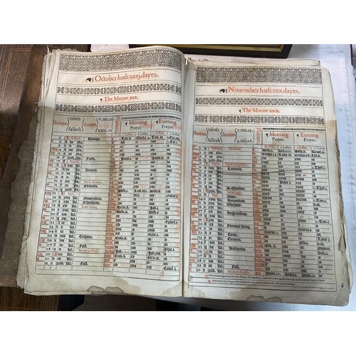 523 - An early 18th century Bible, some pages need attention but in fair condition for age.