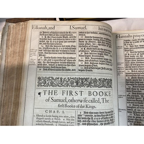 523 - An early 18th century Bible, some pages need attention but in fair condition for age.