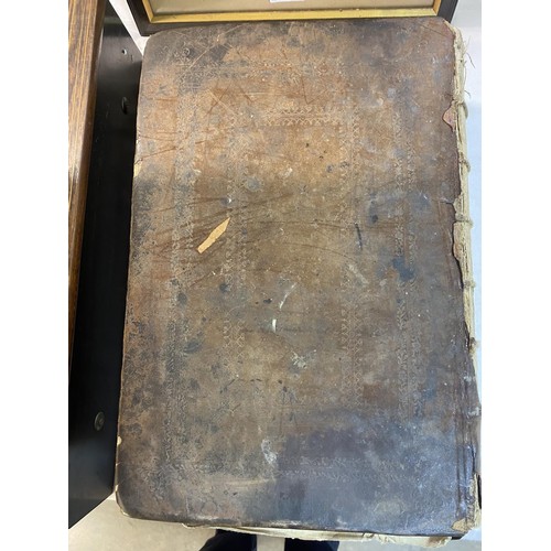 523 - An early 18th century Bible, some pages need attention but in fair condition for age.