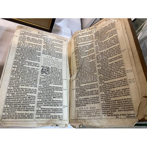 523 - An early 18th century Bible, some pages need attention but in fair condition for age.