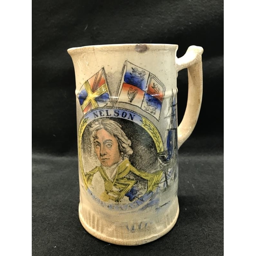 730T - A Nelson Jug A/F and a Nelson Commemorative Jar (missing Lid)