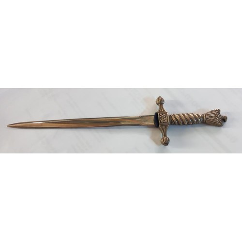 243 - A cased letter opener in the form of a dagger with eagle feature.