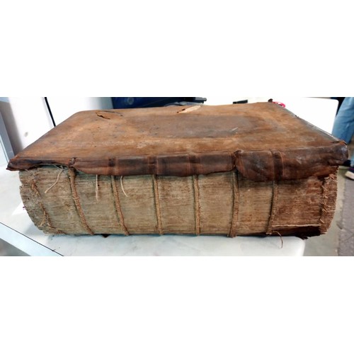 523 - An early 18th century Bible, some pages need attention but in fair condition for age.