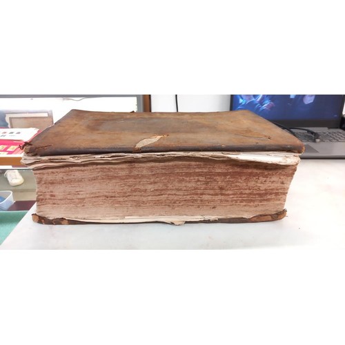 523 - An early 18th century Bible, some pages need attention but in fair condition for age.