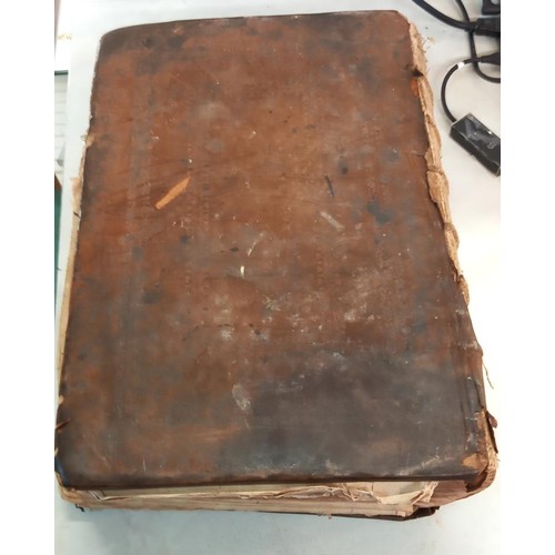 523 - An early 18th century Bible, some pages need attention but in fair condition for age.