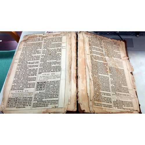 523 - An early 18th century Bible, some pages need attention but in fair condition for age.