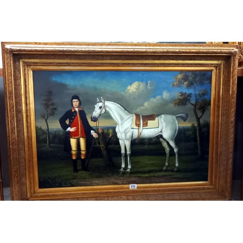 616 - A gilt framed oil on canvas painting of a horse with rider, frame 114 x 84 cm, image 90 x 80 cm, COL... 