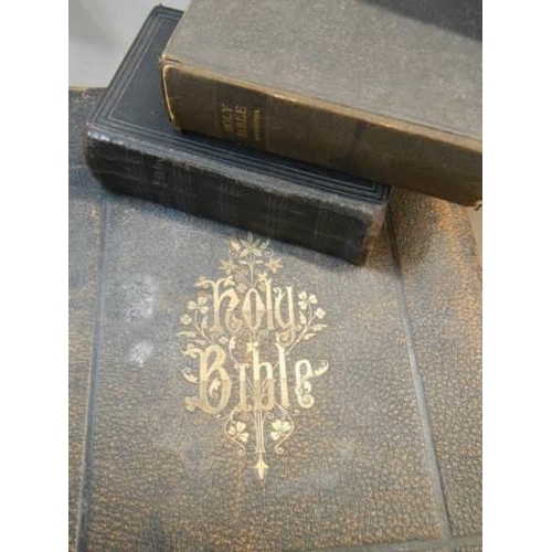 13 - A large old Bible and two smaller examples.