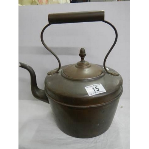 15 - An old copper kettle.