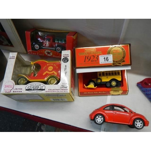 16 - Three boxed die cast vehicle and a boxed Shell limited edition coin box.