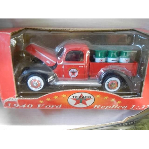 16 - Three boxed die cast vehicle and a boxed Shell limited edition coin box.