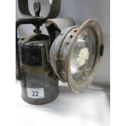 22 - An old hand lamp, in good condition.