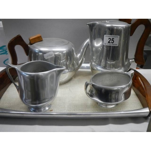 25 - A four piece vintage Piquot ware tea set on tray.