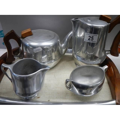25 - A four piece vintage Piquot ware tea set on tray.