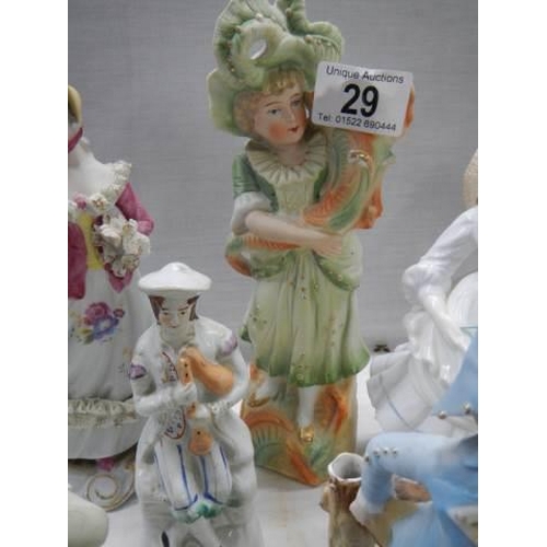 29 - Six assorted porcelain figures.