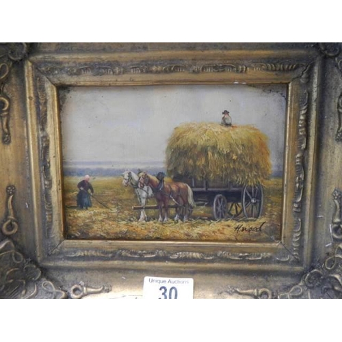 30 - A gilt framed hay making scene.