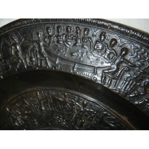 31 - A large cast metal copy of an 18th century charger.