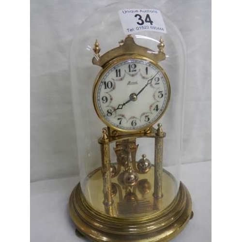 34 - A good quality anniversary clock, COLLECT ONLY.