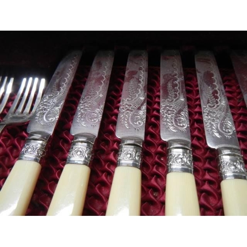 40 - A cased set of six good quality knives and forks.