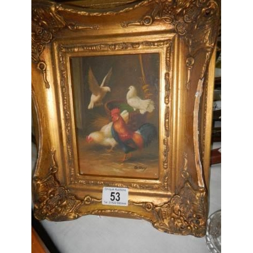 53 - A gilt framed barn study with domestic fowl and doves.