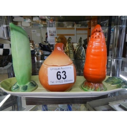 63 - A novelty cruet set.