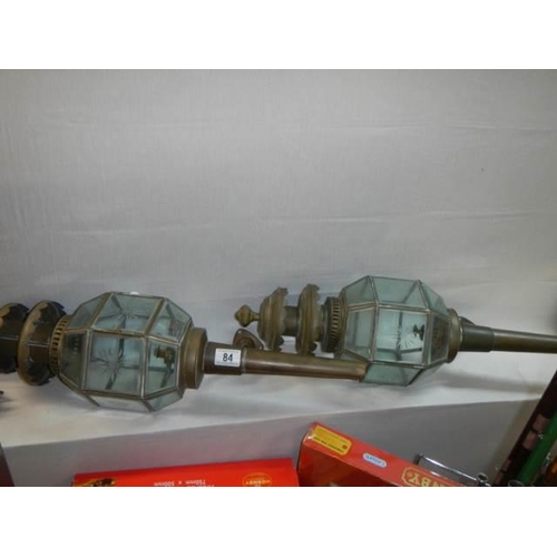 84 - A pair of good quality modern brass carriage lamps.