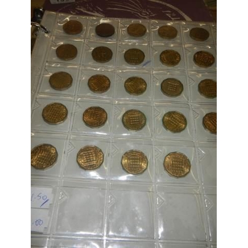 130 - A boxed coin album and mixed coins.