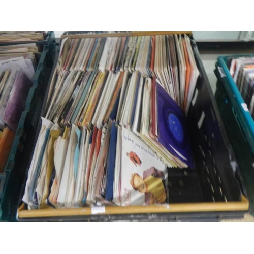 135 - Three large trays of 45 rpm records.