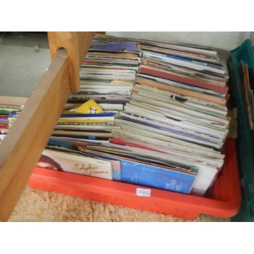 137 - Three large trays of 45 rpm records.