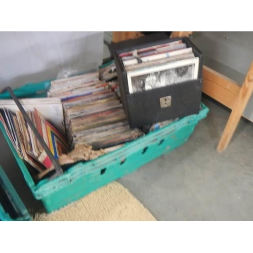 137 - Three large trays of 45 rpm records.