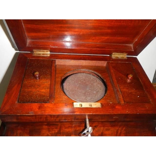 211 - A 19th century mahogany tea caddy.