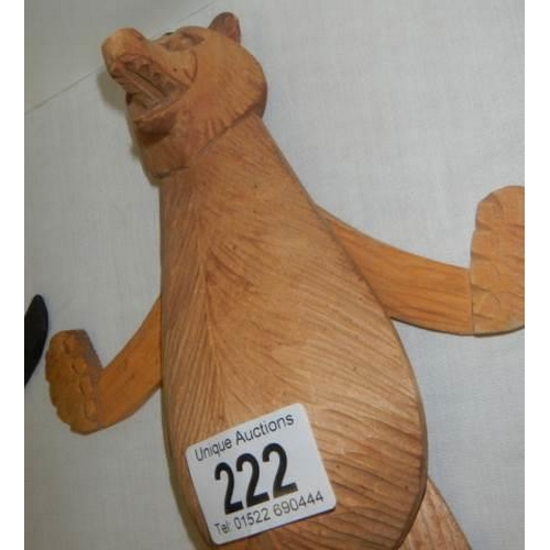 222 - Two articulated wooden bears.