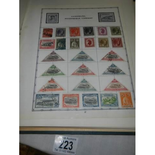 223 - A album of postage stamps.