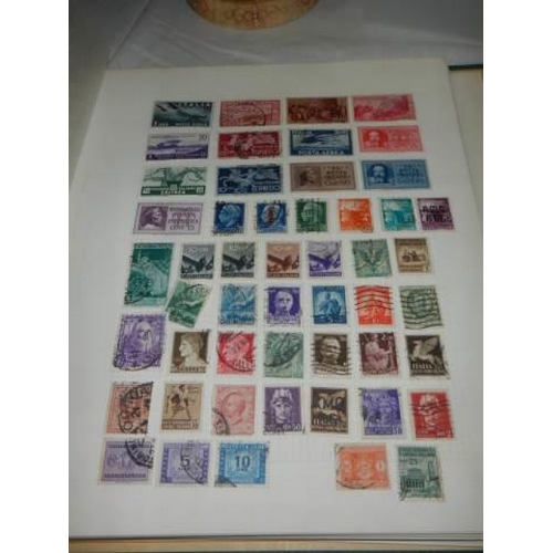 223 - A album of postage stamps.